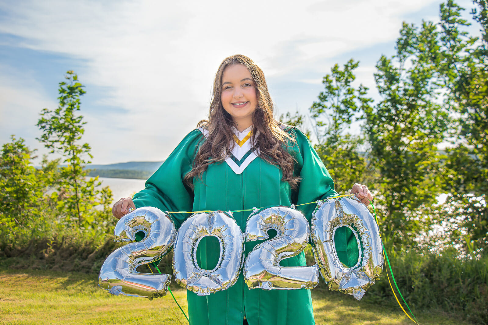 A photo from the Patterson Graduation Photoshoot, shot in Annapolis Royal, Nova Scotia at the Fort Anne on a beautiful sunny day